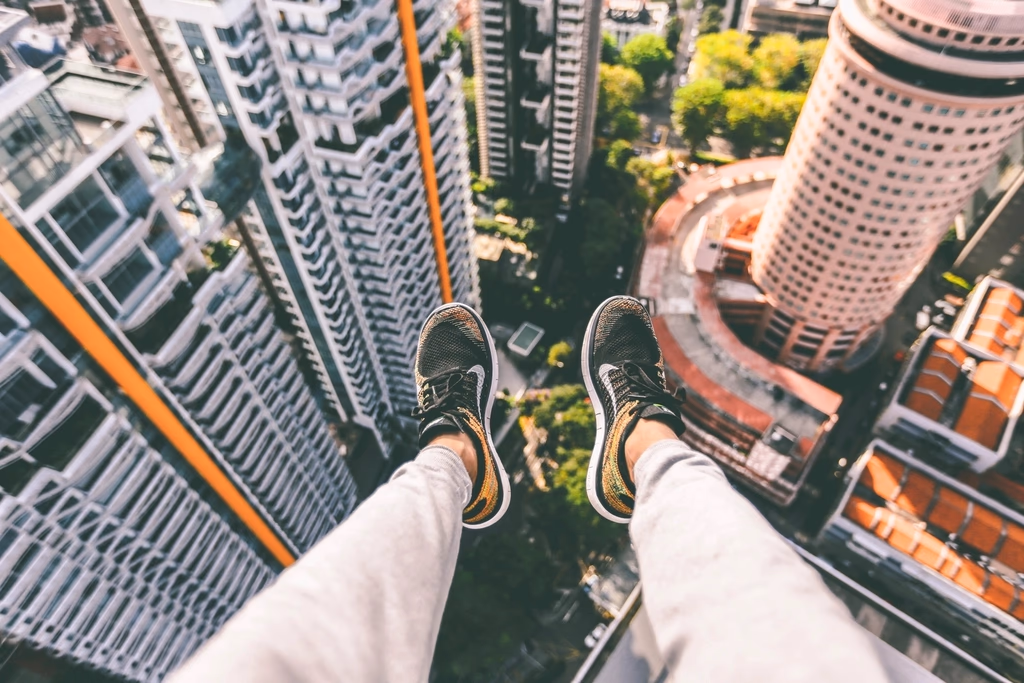 Rooftop parkour against a city skyline
