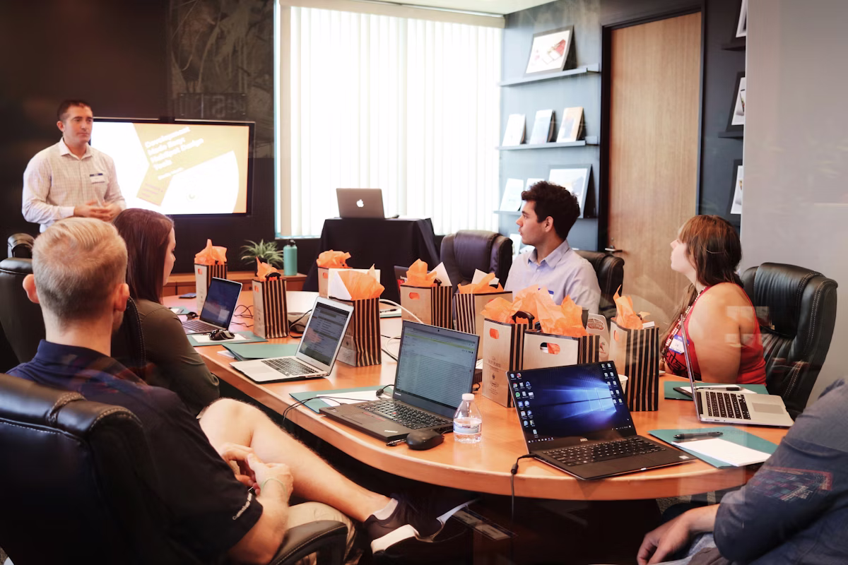 Creative team reviewing screens